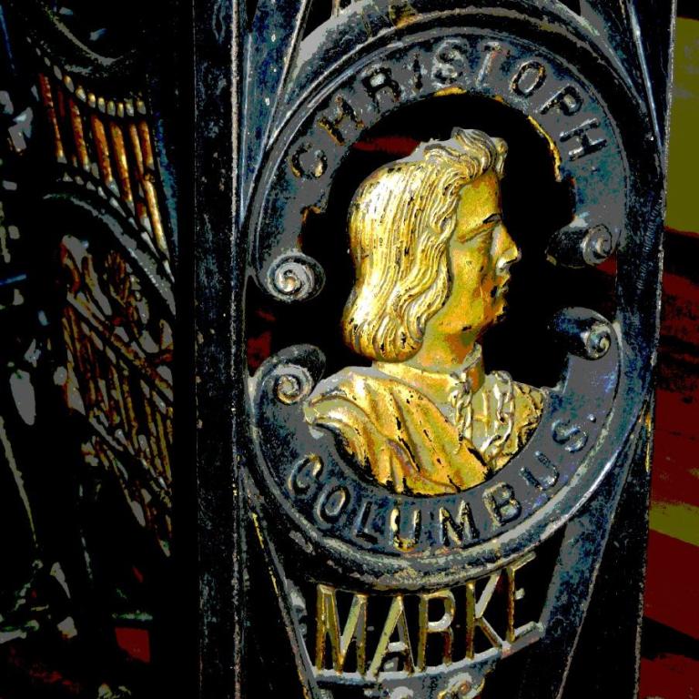 Bronzene Plakette mit dem Porträt von Christoph Kolumbus und den Namen A. Schutz und Kolumbus
